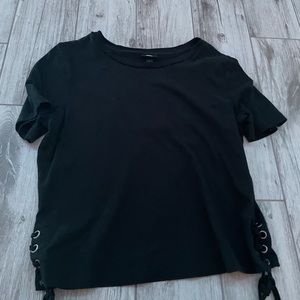 Black shirt with circles on the side with ties